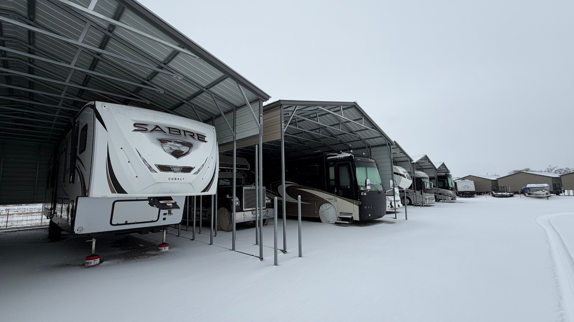 Fifth_Wheel_and_Motorhome_under_covered_storage-20260125-180051.png